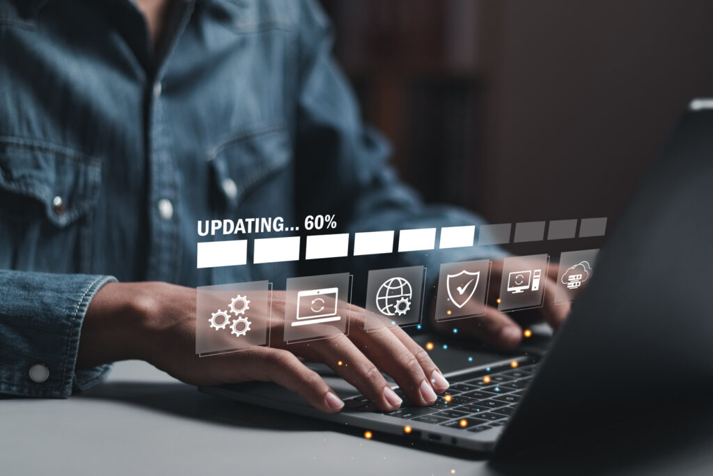 Businessman working and installing update process. Patch management keeps software security updates or operating system upgrades up to date with enhanced functionality.