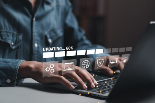 Businessman working and installing update process. Patch management keeps software security updates or operating system upgrades up to date with enhanced functionality.